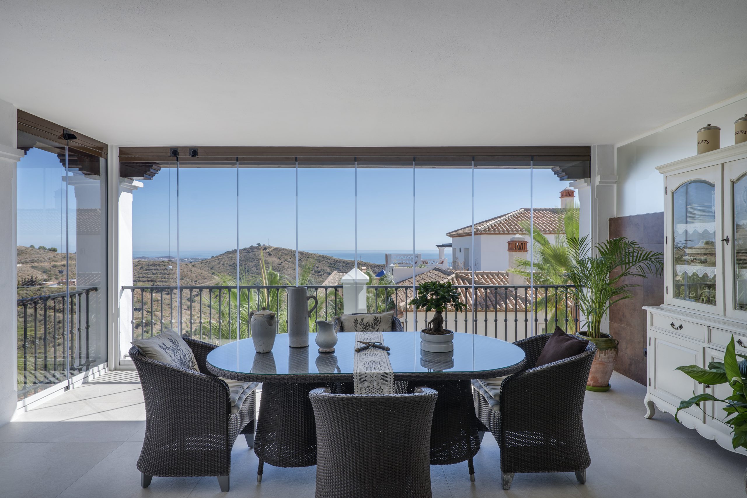 Cortina de cristal abatible